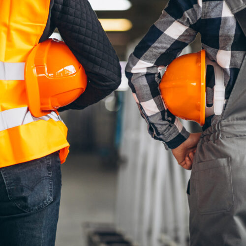 Two colleagues at a factory